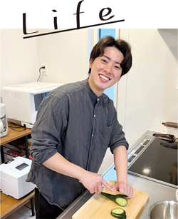 料理をする中田さんの写真